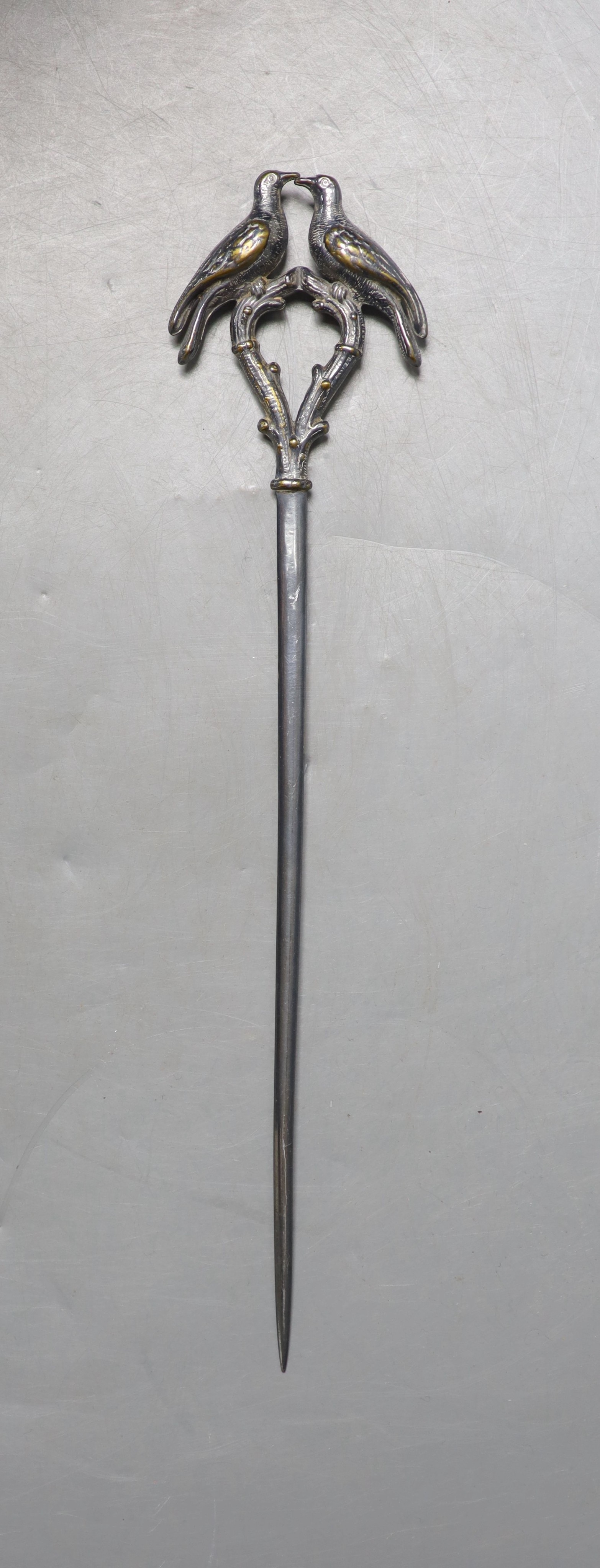 A 19th century French silver plated game skewer by Sabatier, with twin bird terminal, 27cm.